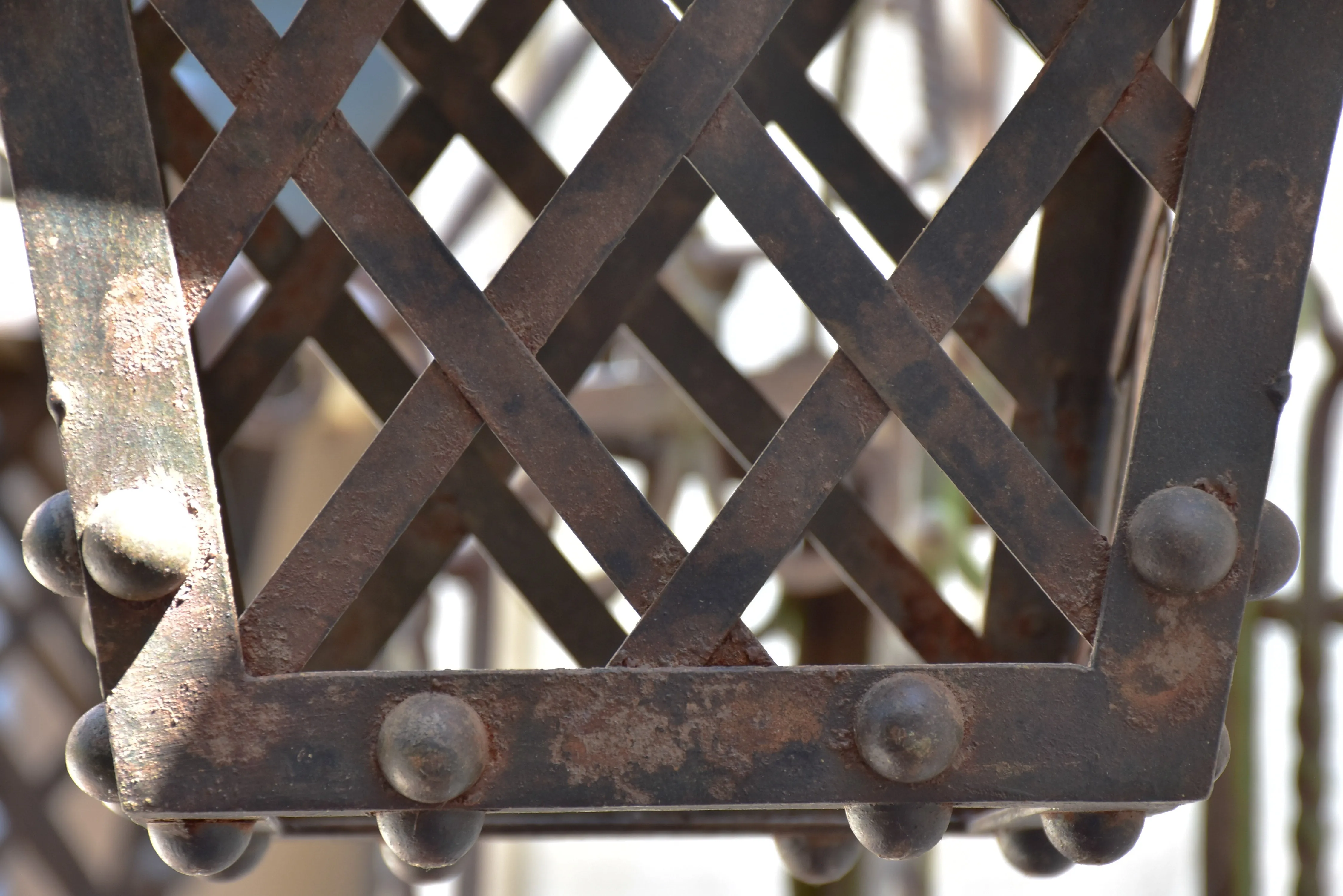 Pair of French wrought iron lanterns with wall brackets